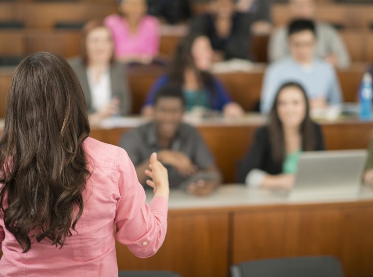 Young scientist giving lecture