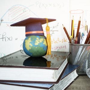 Graduation cap on earth globe